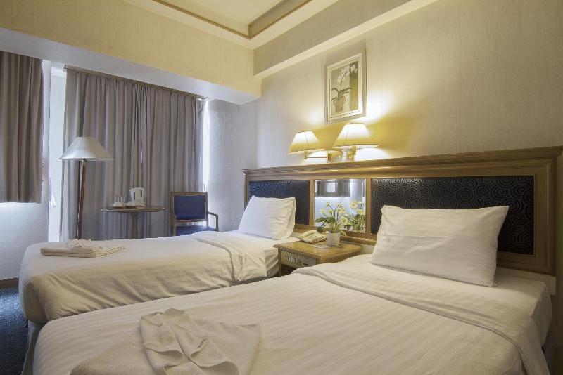 Bossotel Chiang Mai Quarto foto